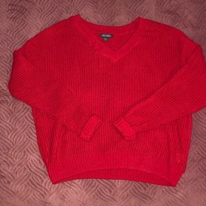Cropped red knit sweater